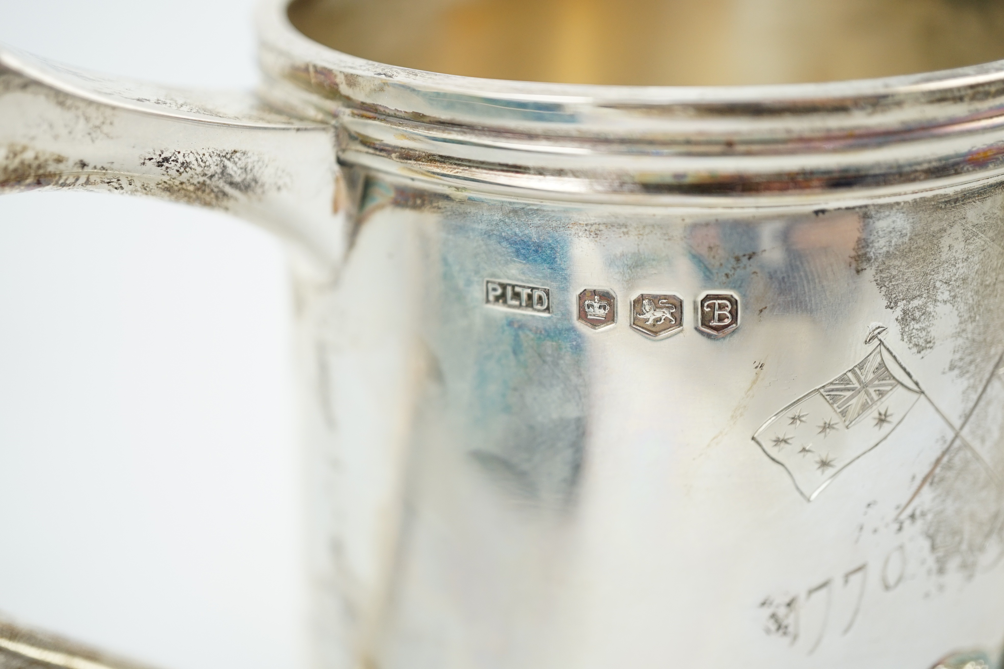 A cased Elizabeth II silver limited edition mug, engraved to commemorate the voyage of Lt. James Cook, in H.M. Bark Endeavour, to Australia